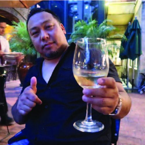 Chuck Ghale enjoying a toast of manang wine